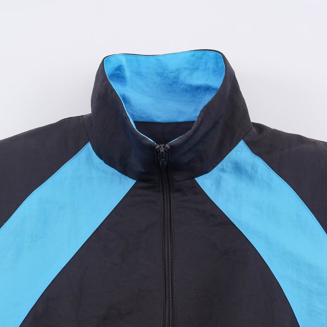 Damen Retro-Colorblock Windbreaker mit Tunnelzug und Stehkragen Echoarchiv