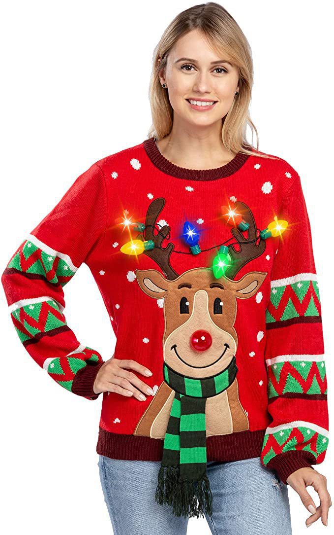 Damen nan weihnachtlicher Strickpullover mit Rentierapplikation integrierter Lichterkette und dreidimensionalem Nasenpompom Echo Archiv