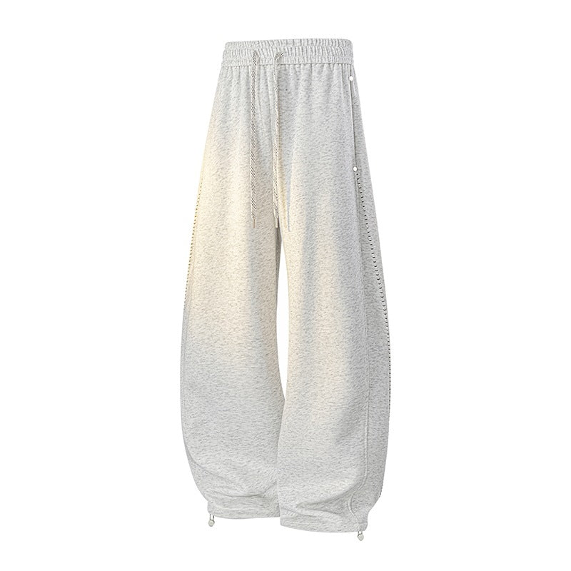 Herren Oversize-Baggy-Jogginghose mit Tunnelzug, seitlicher Druckknopfleiste & verstellbaren Beinabschlüssen Echoarchiv