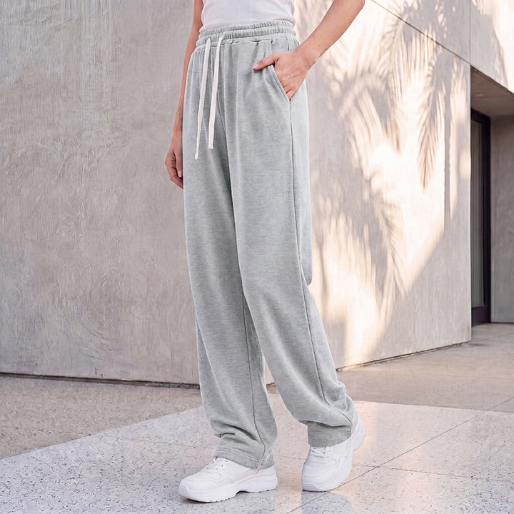 Damen nan weite Loungepalazzo-Hose mit hohem Komfortbund, Kordelzug, seitlichen Eingrifftaschen und dekorativer Seitennaht Echo Archiv