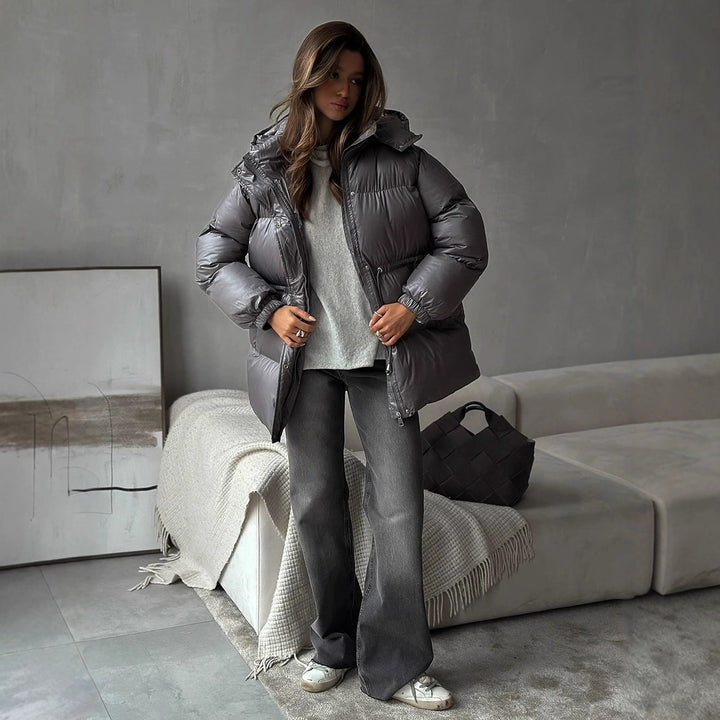 Damen gesteppte Steppjacke mit Taillenzug und Kapuze Echoarchiv