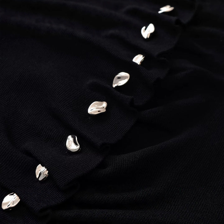 Damen Figurbetonte Rüschenbluse mit goldfarbenen Zierknöpfen und asymmetrischem Peplum Echoarchiv