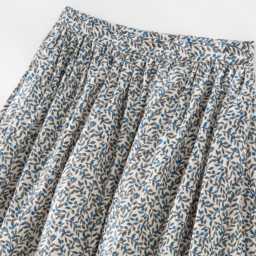 Damen Midirock mit Plissée‑Optik, gerafftem Bund und floralem Print Echoarchiv