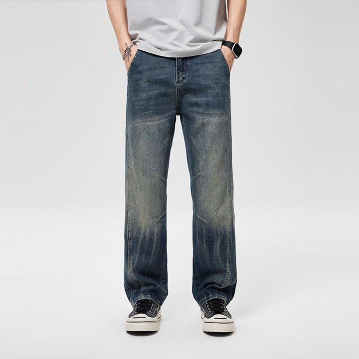 Herren Weite Baggy-Jeans im Vintage‑Wash mit Knie‑Detail Echoarchiv