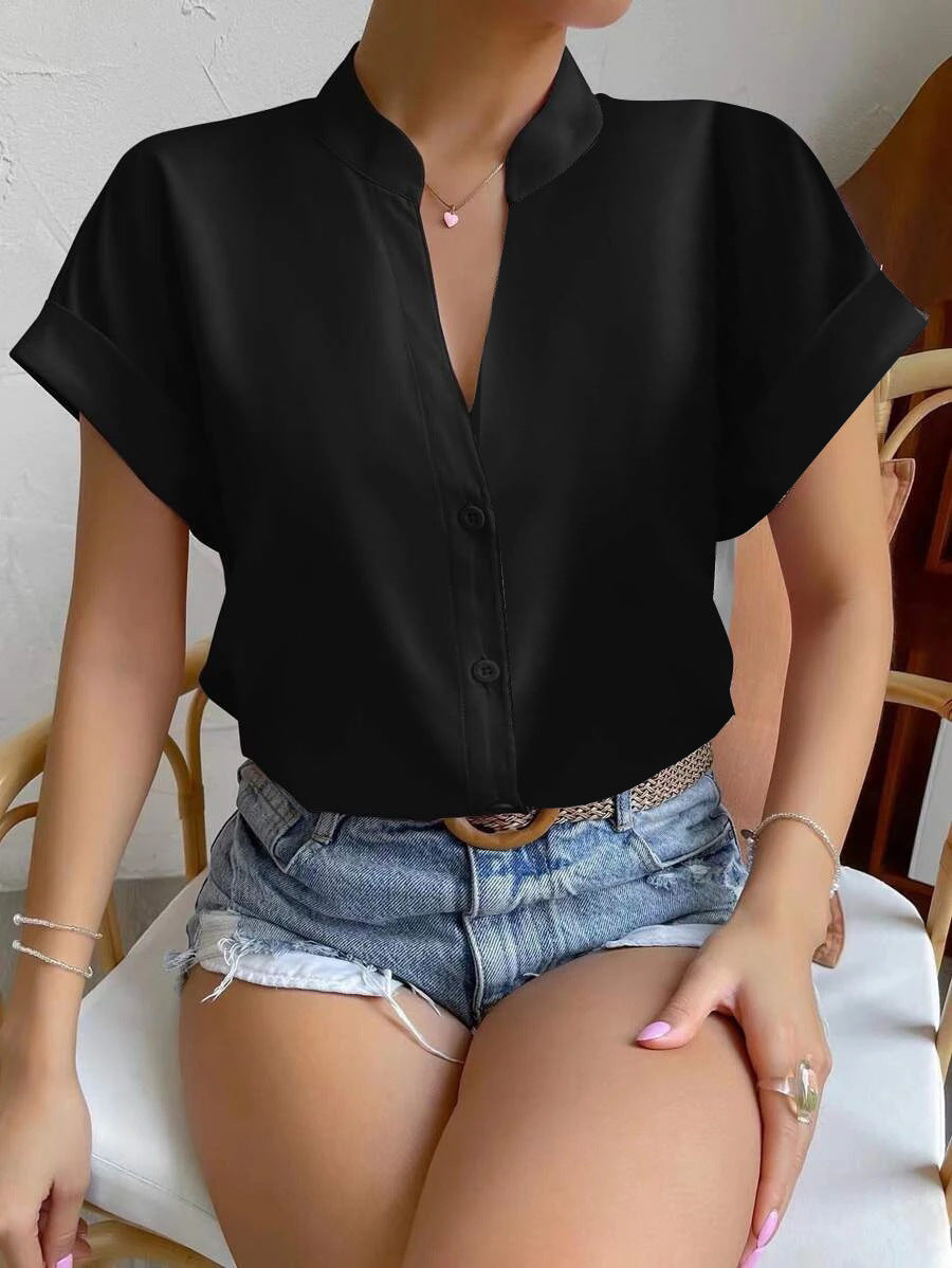 Damen Elegante Kurzarmbluse mit Stehkragen und subtilen Knopfdetails Echoarchiv