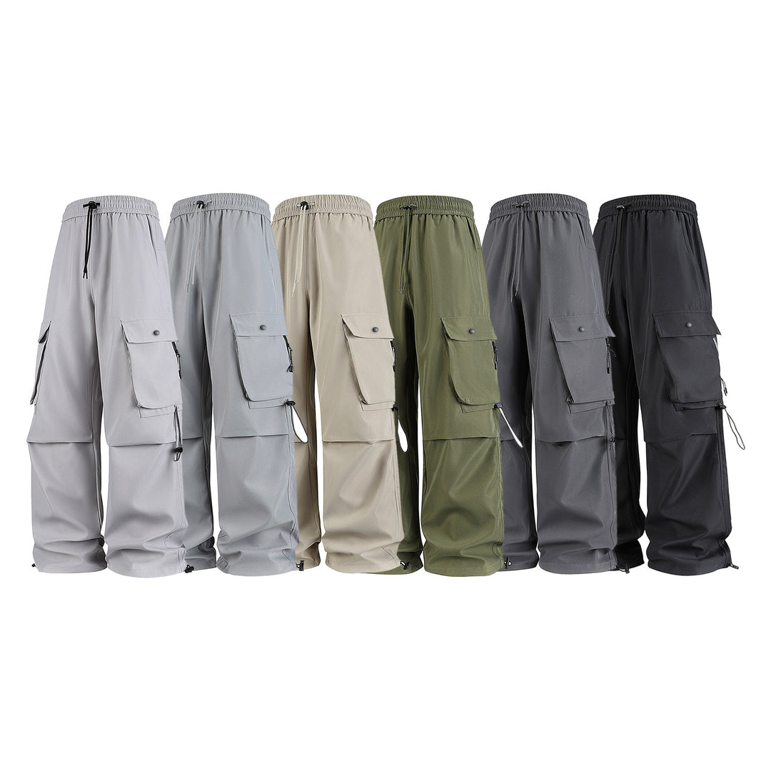 Herren Baggy‑Cargohose im Tech‑Utility‑Stil mit elastischem Tunnelzugbund, großen Klappfächern und Zipper‑Details Echo Archiv