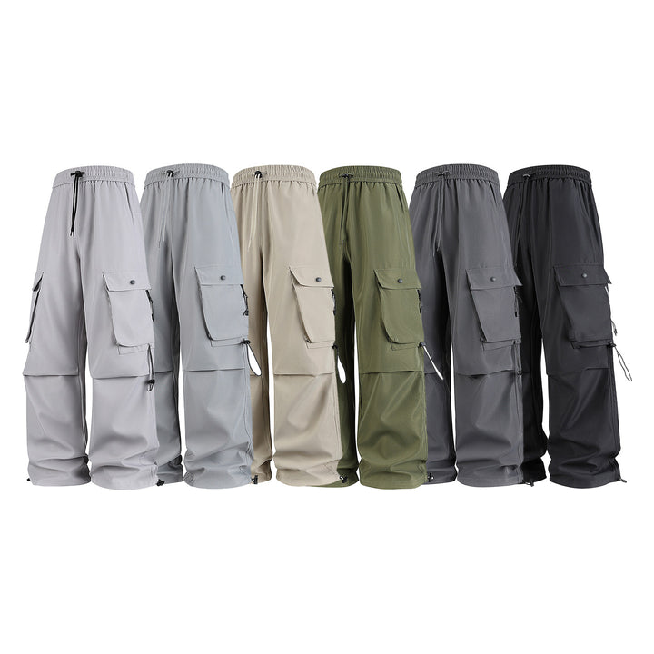 Herren Baggy‑Cargohose im Tech‑Utility‑Stil mit elastischem Tunnelzugbund, großen Klappfächern und Zipper‑Details Echo Archiv