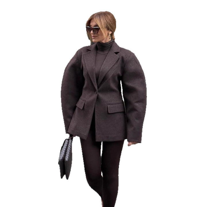 Damen Oversize-Strukturblazer mit betonter Schulterpartie und voluminösen Ärmeln Echoarchiv