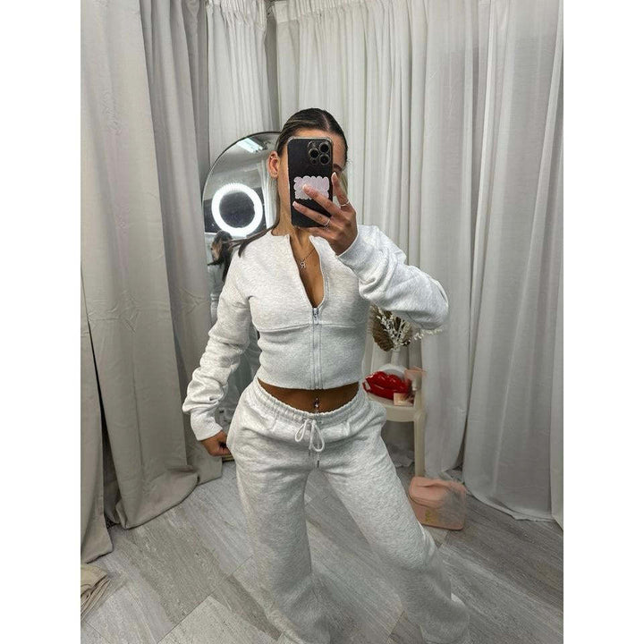 Damen nan kurzes Zip-Cropped-Shirt mit formendem Bund und breite Relax-Sweatpants mit Tunnelzug Echo Archiv