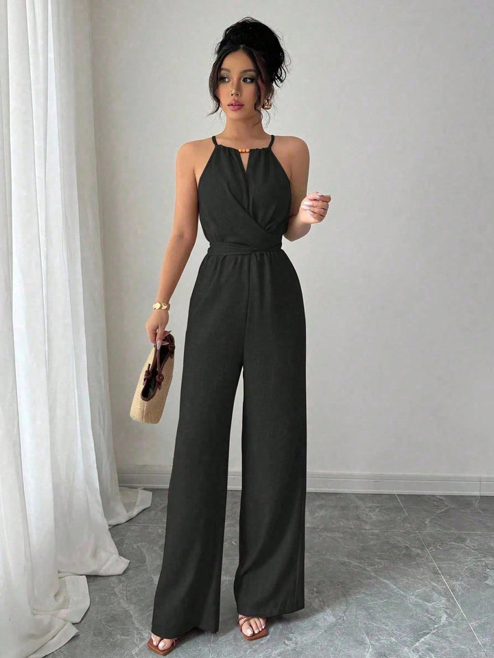 Damen Ärmelloser Neckholder-Jumpsuit mit Wickeloberteil und weitem Bein Echo Archiv
