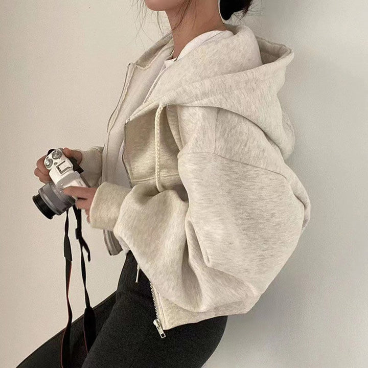 Damen oversized cropped Kapuzenjacke mit Reißverschluss und Ballonärmeln – Auréline