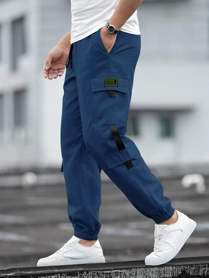 Herren modische Cargo-Joggerhose mit elastischem Bund, Kordelzug und mehreren Sicherheits- und Klappentaschen – Bravaro