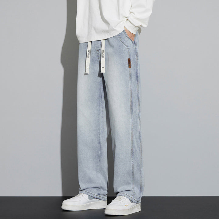 Herren Weite Denim-Hose im Lounge-Style mit Tunnelzugbund und geradem Bein Echo Archiv