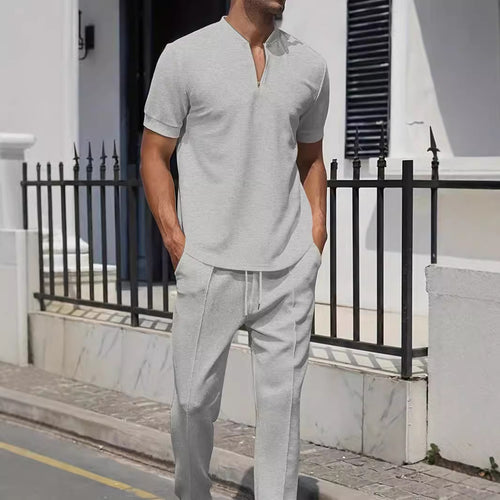 Herren sportliches Zweiteiler-Outfit mit modernem Reißverschluss und atmungsaktiven Materialien Echoarchiv