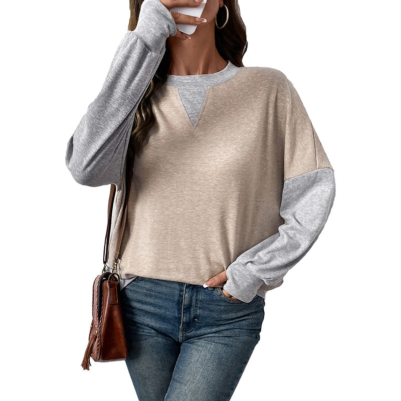 Damen Zweifarbiger Oversize-Langarmpullover mit Kontrastärmeln und V-Naht Echoarchiv