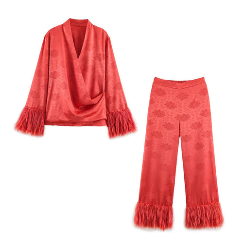 Damen hochtaillierte Satinhose mit Jacquard‑Blütenmuster und Federfransen Echo Archiv