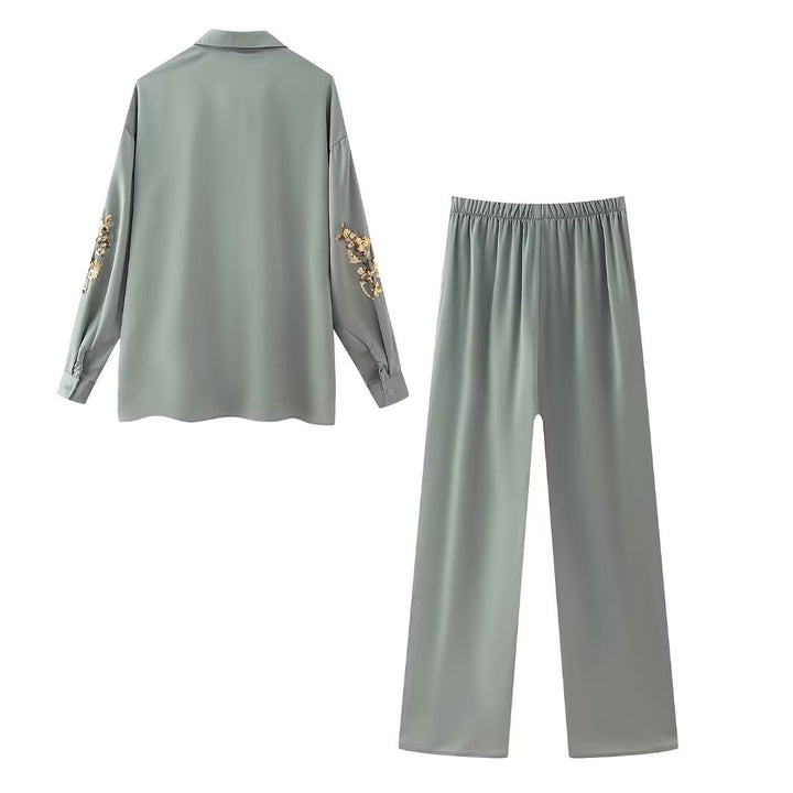 Damen weite Satinhose mit elastischem Bund und goldenen Paillettenblüten – Avélisse