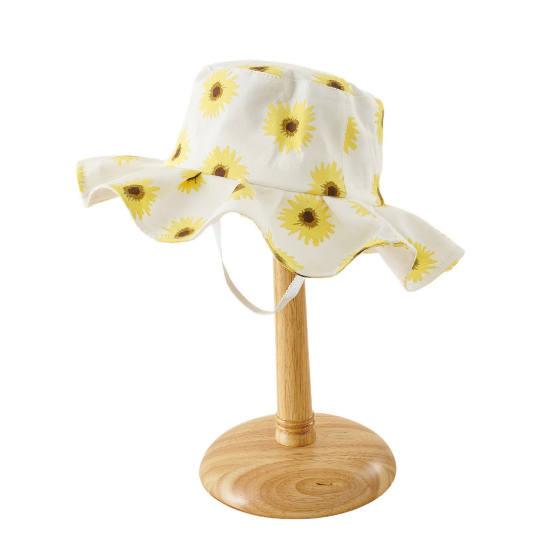 Damen Sonnenhut mit breiter Rüschenkrempe und Sonnenblumen‑Print – Avérine
