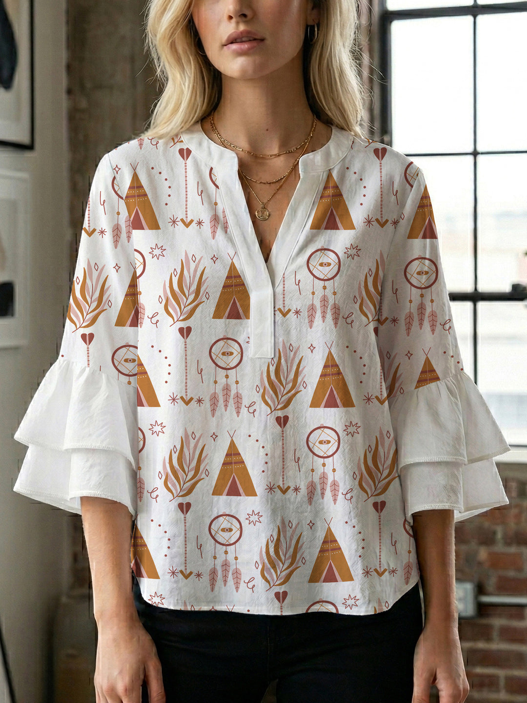 Damen Bluse mit voluminösen Rüschenärmeln und modernem Motiv Echo Archiv