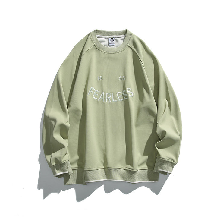 Unisex Oversize-Sweatshirt mit Raglanärmeln und markantem FEARLESS-Frontprint Echo Archiv