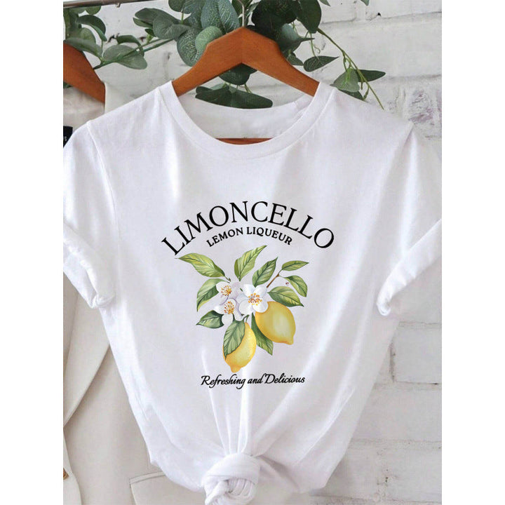 Damen T-Shirt mit frischem Limoncello-Motiv und floralen Akzenten Echoarchiv
