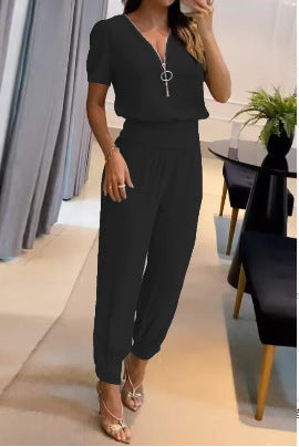 Damen Jumpsuit mit V-Ausschnitt und Gummizug Echoarchiv