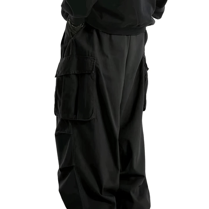 Herren Baggy-Cargo-Hose mit übergroßer Passform, elastischem Tunnelzugbund & mehrfachen Klappfächern Echo Archiv