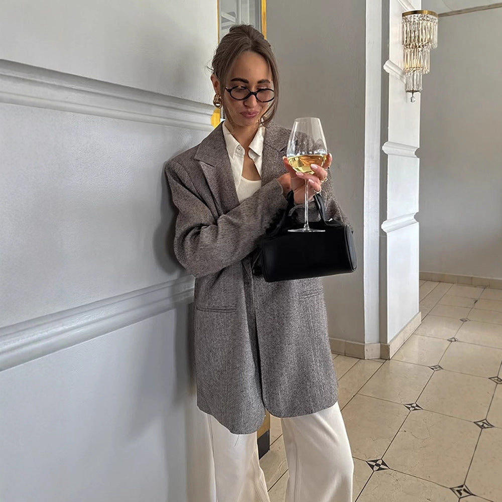 Damen Langer oversized Wollmix-Mantel mit einreihiger Knopfleiste, fallendem Revers und Eingrifftaschen Echoarchiv