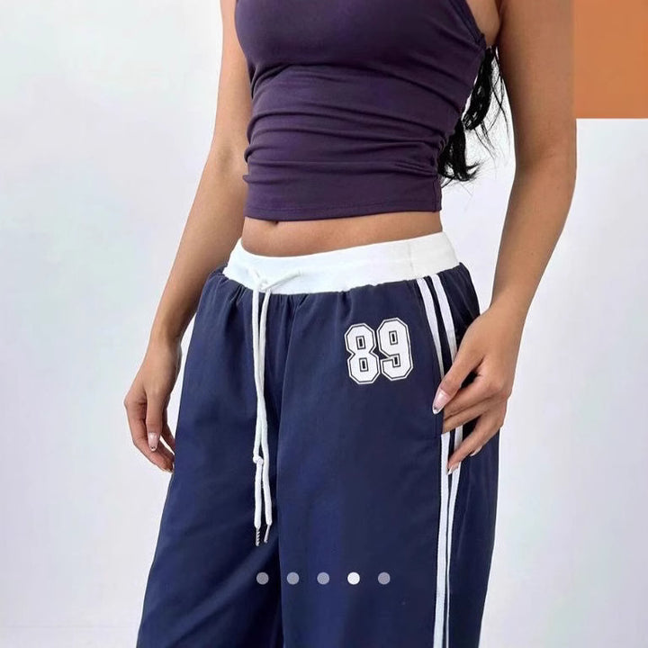 Damen Sportliche Jogginghose mit seitlichen Streifen Echo Archiv