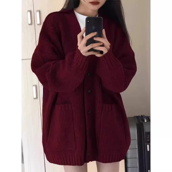 Damen Oversize Strickcardigan mit aufgesetzten Taschen und durchgehender Knopfleiste Echoarchiv