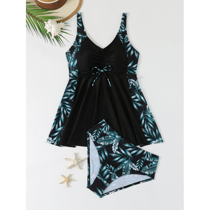 Damen Badeanzug mit asymmetrischem Rock und floralen Details Echo Archiv