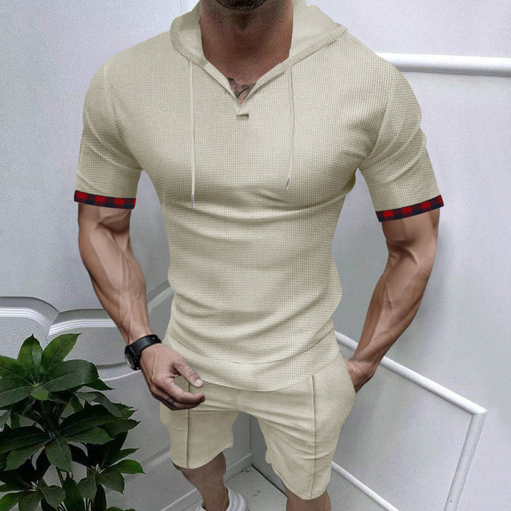 Herren sportliches Kurzarm-Hemden- und Shorts-Set mit Kapuze und kontrastierenden Ärmelabschlüssen Echoarchiv