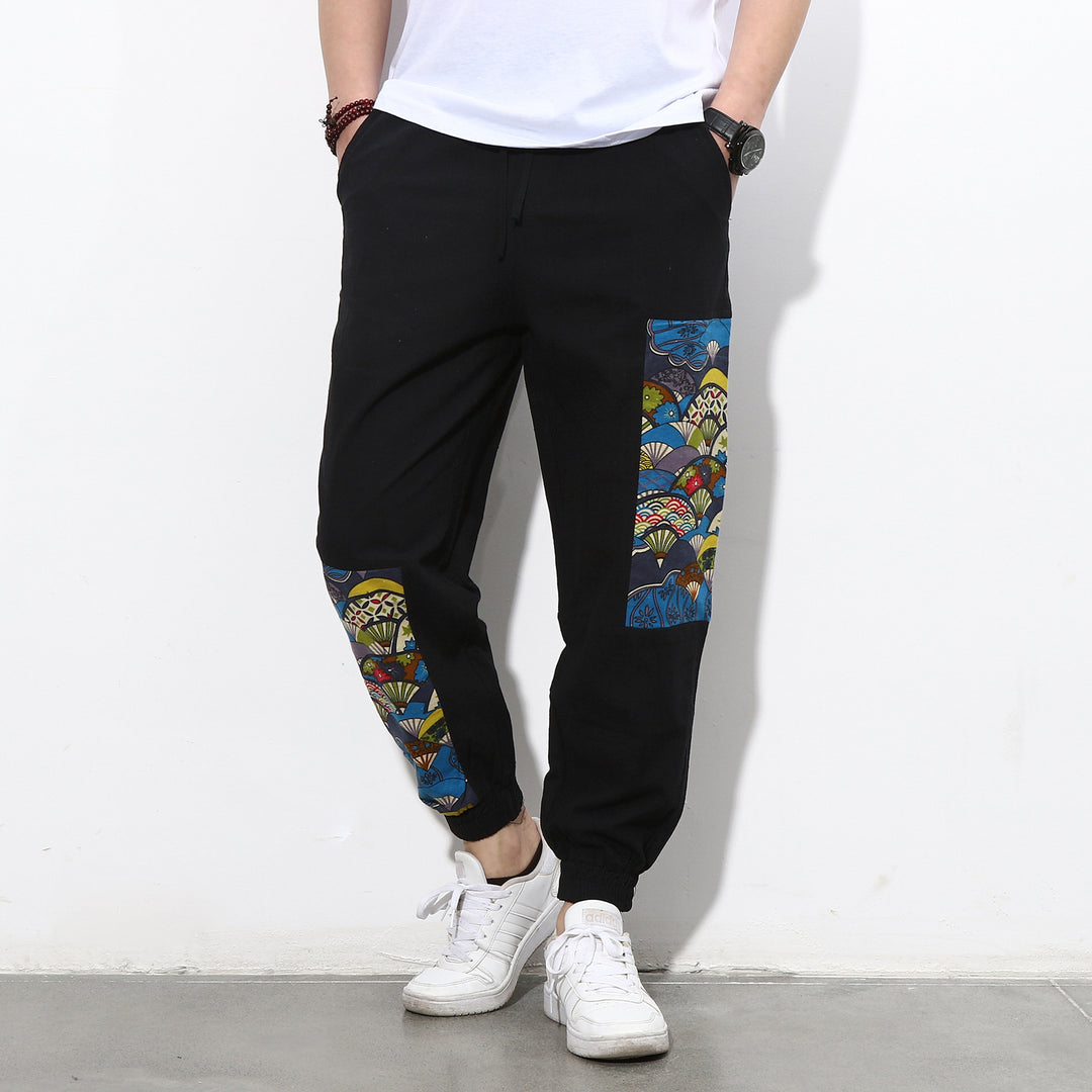 Herren Jogginghose mit seitlichen Panel-Prints, Tunnelzug und gerippten Bündchen Echo Archiv