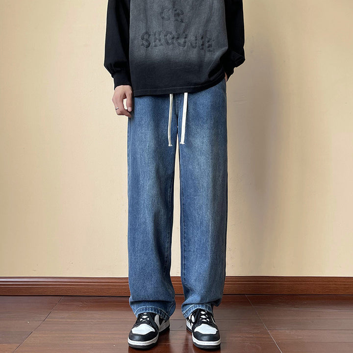 Herren locker sitzende Jeanshose im Oversize-Baggy-Stil mit Tunnelzug Echo Archiv