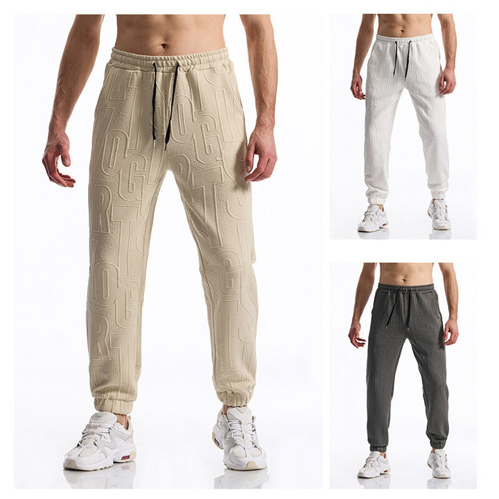 Herren Jogginghose mit elastischem Bund, Tunnelzug und geprägtem Allover‑Logo‑Relief Echo Archiv