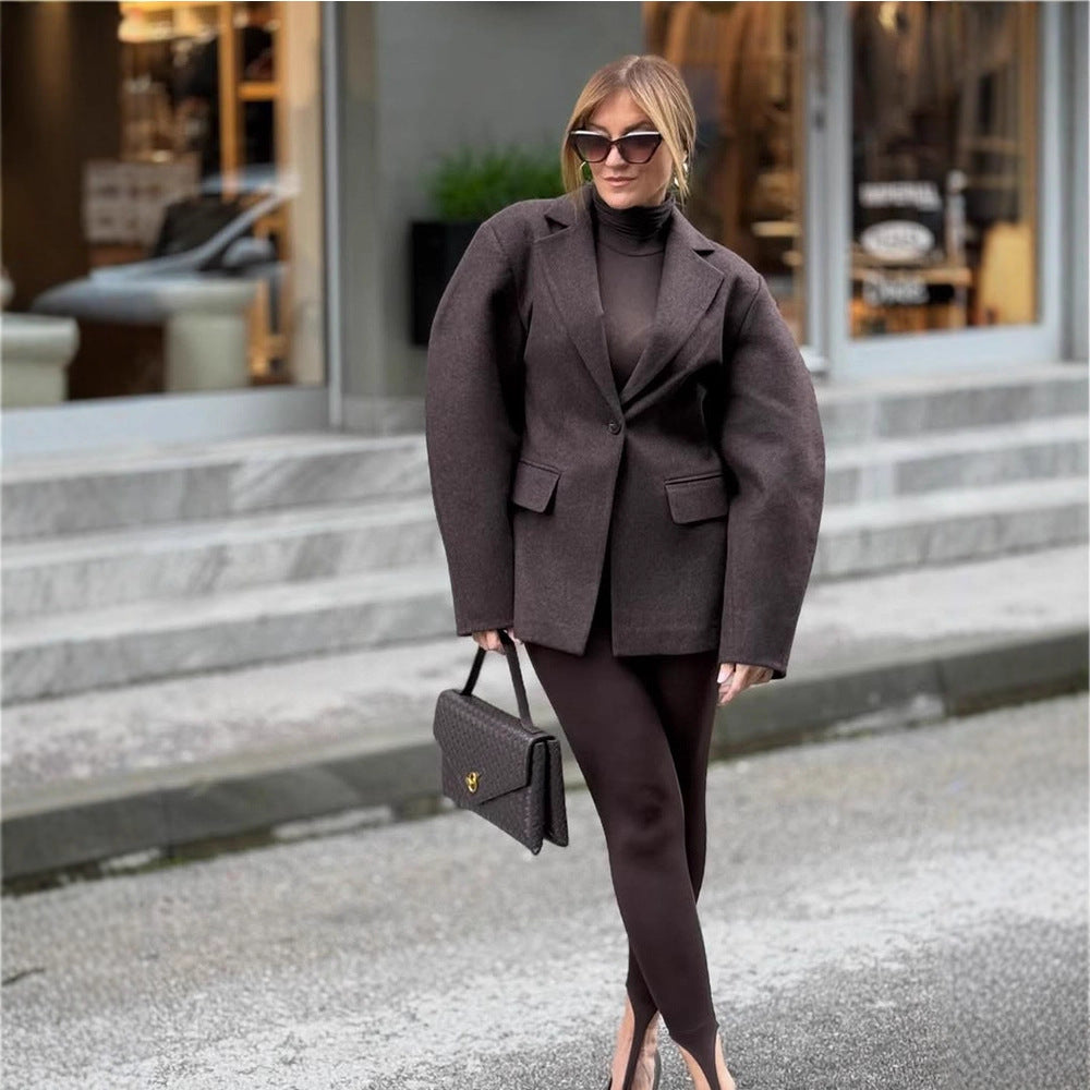 Damen Oversize-Strukturblazer mit betonter Schulterpartie und voluminösen Ärmeln Echoarchiv