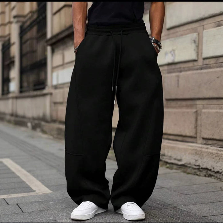 Herren weite Sweatpants im Baggy Cut mit elastischem Bund, Tunnelzug und Eingrifftaschen Echo Archiv