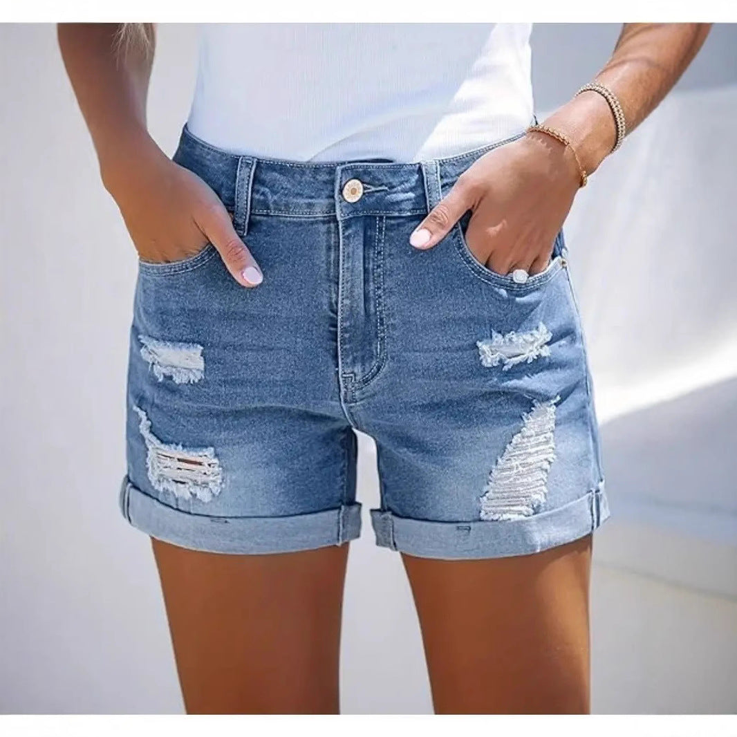 Damen kurze Destroyed Denim-Shorts im lässigen Look mit umgeschlagenen Säumen und stylischen Rissdetails Echo Archiv