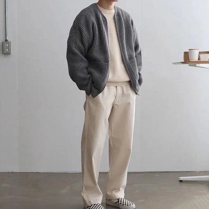 Herren Grobstrick-Jacke mit voluminösen Ärmeln und steigendem Kragen Echoarchiv