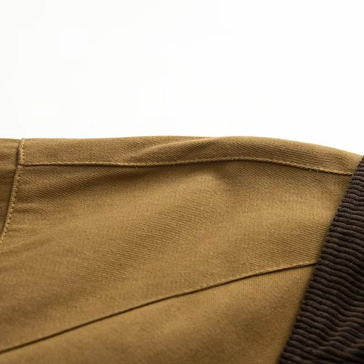 Damen oversize Cape-Mantel mit Cordkragen, Knebelverschlüssen und großen aufgesetzten Klappentaschen – Montévia