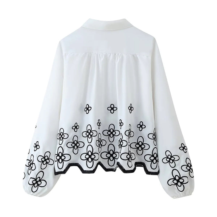 Damen bestickte Chiffon-Bluse mit floralem Saum, Volumenärmeln und Hemdkragen – Élovi