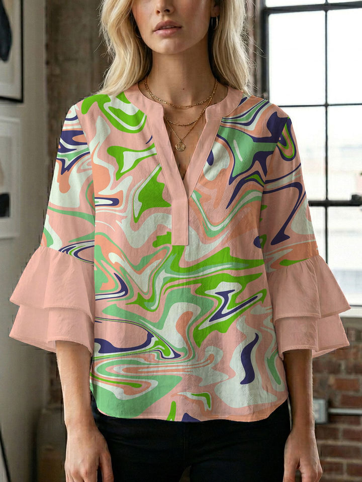 Damen Blusenshirt mit voluminösen Ärmeln und kreativem Druckdesign Echo Archiv