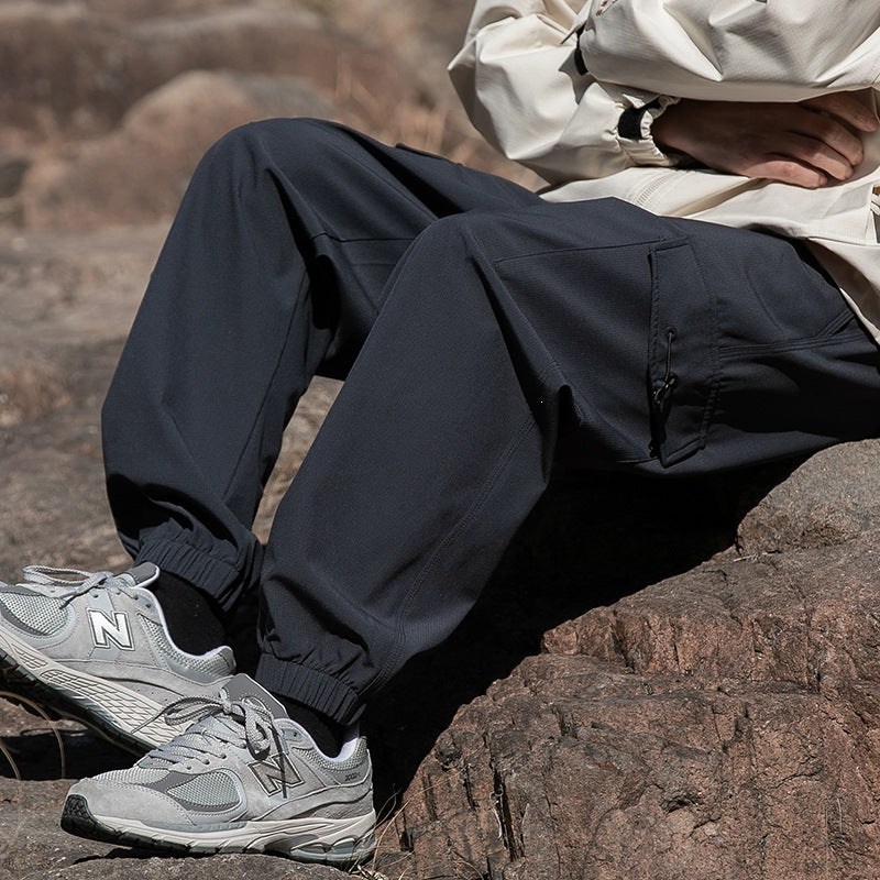 Herren Weite Relaxed-Cargo-Freizeithose mit Tunnelzugbund & Multifunktions‑Taschen Echoarchiv