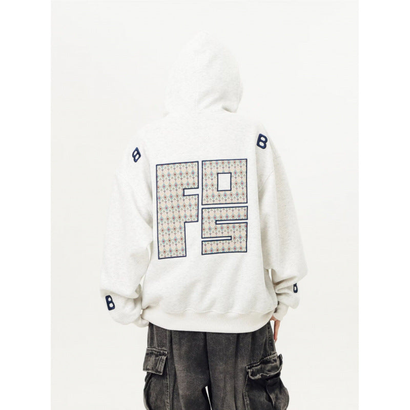 Unisex Oversized Kapuzenpullover mit großflächigem Intarsien‑Blockprint und geripptem Saum Echoarchiv
