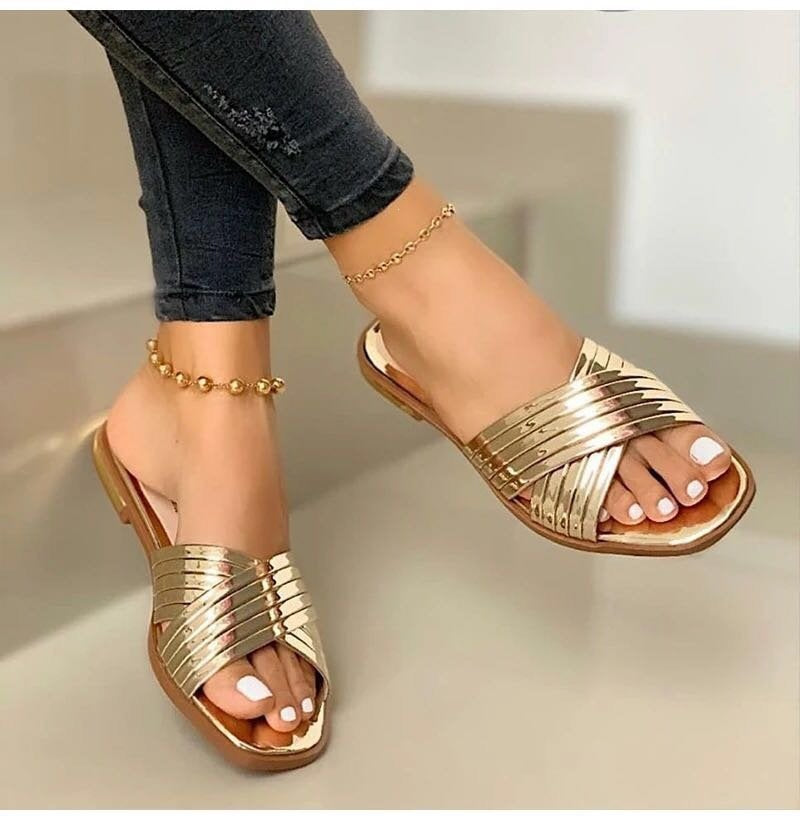 Damen Geflochtene Metallic-Slipper mit überkreuzten Riemen und flacher Komfortsohle – Lioré