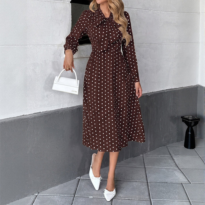 Damen Elegantes Midikleid mit Schluppe und Punkten Echo Archiv