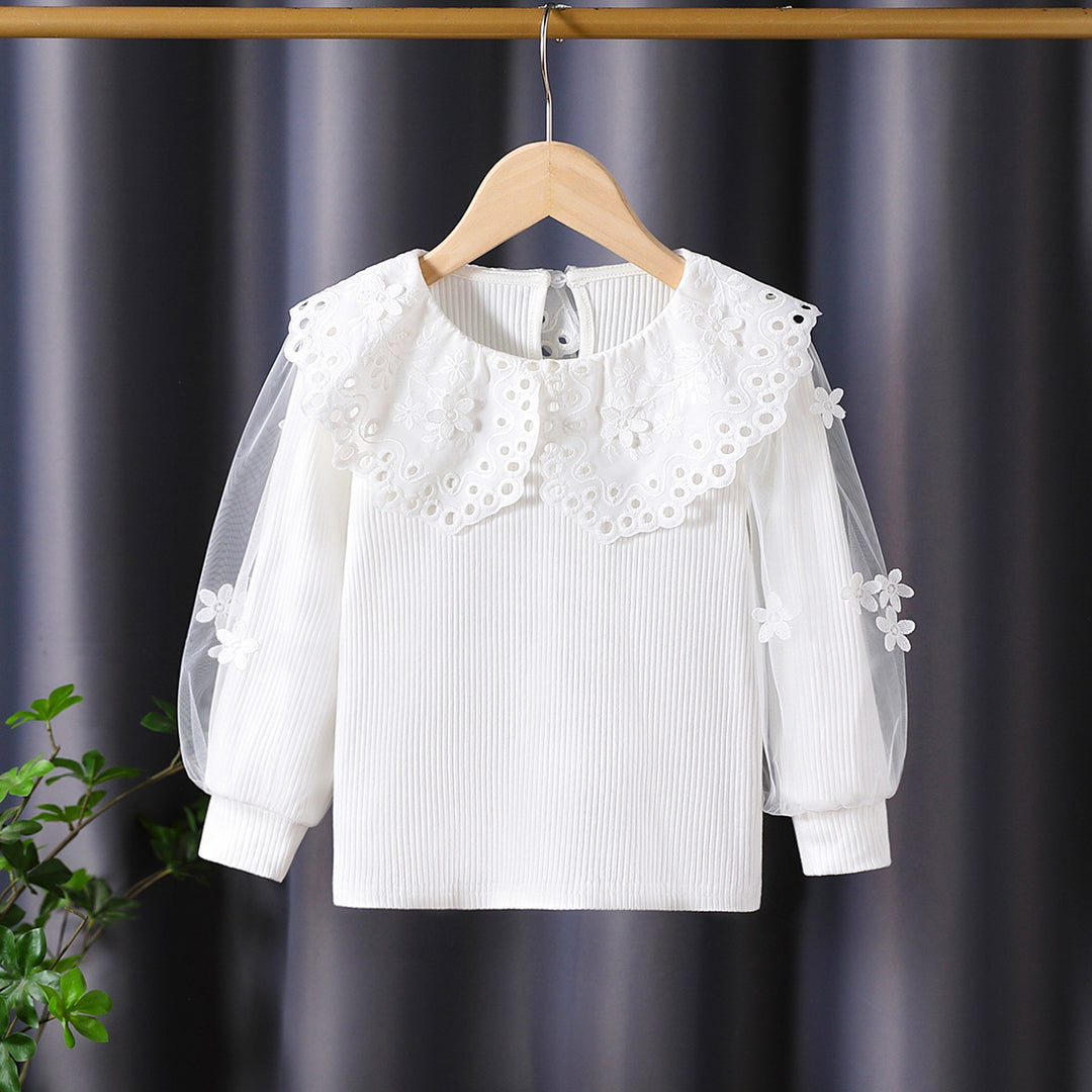 Mädchen Bluse mit voluminösen Tüllärmeln und aufwändigen Blumenstickereien Echo Archiv