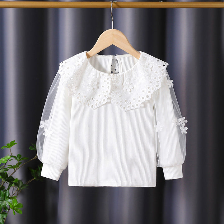 Mädchen Bluse mit voluminösen Tüllärmeln und aufwändigen Blumenstickereien Echo Archiv