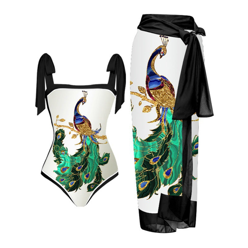 Damen Einteiler Badeanzug mit elegantem Wickelrock und modischen Riemen Echo Archiv