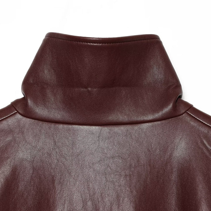 Damen Cropped Boxy-Bomberjacke in glänzender Lederoptik mit hohem Funnelkragen Echoarchiv